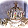 Joy ~ Crown set $225. Gold wire opened frame large crown decorated with pearls, multi-color gems, gold braid trim; base covered in iridescent confetti fabric and gold cord trim; 2' Elegant scepter.