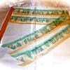 Warfare Organza Wave Streamer Standard $20. Green camouflage with coordinating solid color organza ribbons.